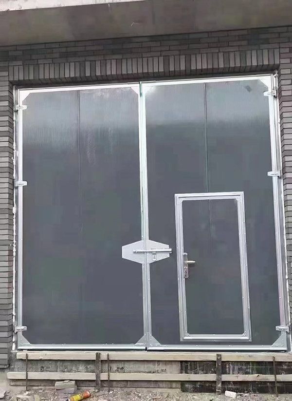 七里河工业平开门在大型设备制造车间的应用实例